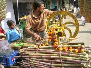 Man selling sugarcane juice