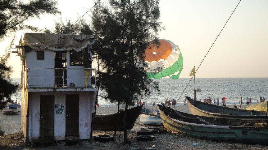 Parachute landing behind  a tower